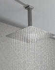 Lorton brushed nickel 12" rain shower head in use, soft and full rainfall water flow.