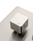 Three-way shower diverter knob with engraved function icons for smooth switching.