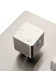 Three-way shower diverter knob with engraved function icons for smooth switching.