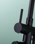Close-up of upper lever on Freestanding Black Tub Faucet with Handheld Shower.