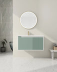 Front view of mint green 36 bathroom vanity sink with round mirror | Ace Decor