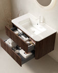 Ravello Series Walnut Floating Vanity with open drawers showing organized bathroom storage space.