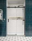 Lumora matte black semi-frameless sliding shower door with exposed rollers in a white subway-tile shower | Ace Decor