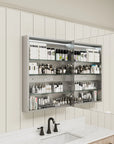 Single-door medicine cabinet with neatly organized bottles on glass shelves.