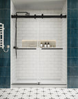 Front view of 60 x 76 dual sliding shower doors with matte black hardware in a modern bathroom with white subway tiles and blue accent walls | Ace Decor