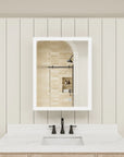 Anti-fog LED medicine cabinet mirror clearing steam.