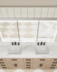 Three-door medicine cabinet top view with LED lights on