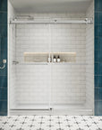 Front view of 72 x 76 chrome frameless shower door sliding design with sleek handles in a modern white subway tile bathroom | Ace Decor