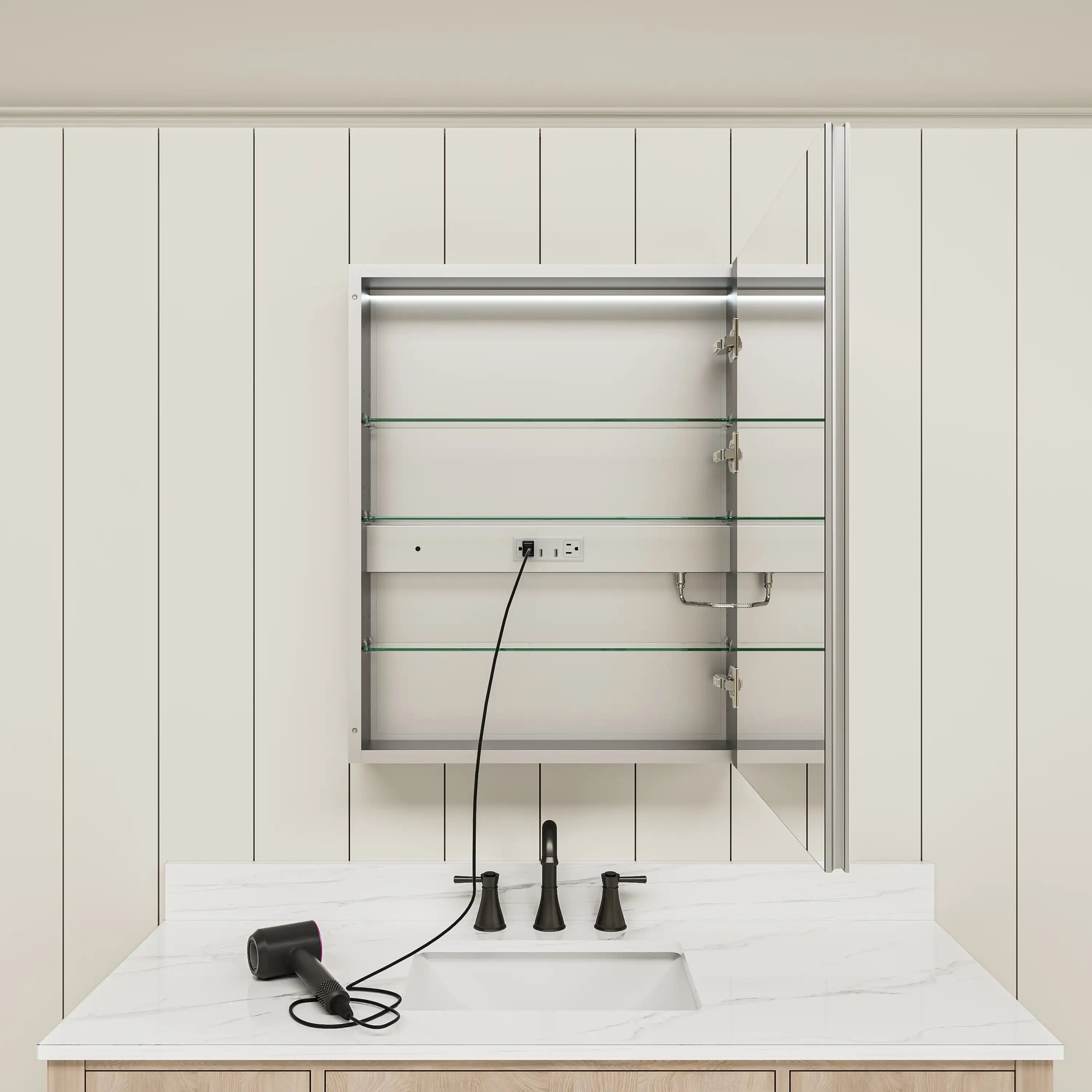 Open medicine cabinet with glass shelves and built-in outlet.