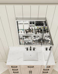 Top view of single-door medicine cabinet half open showing layered storage.