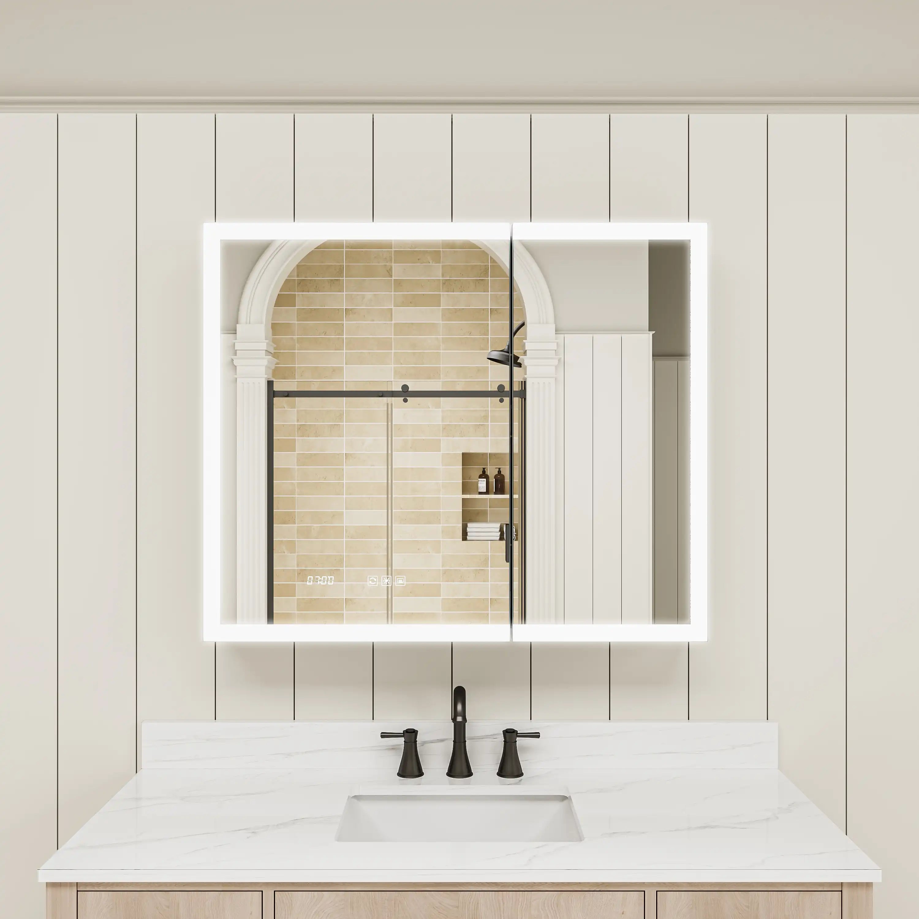 Double-door LED medicine cabinet with lights on above bathroom sink.