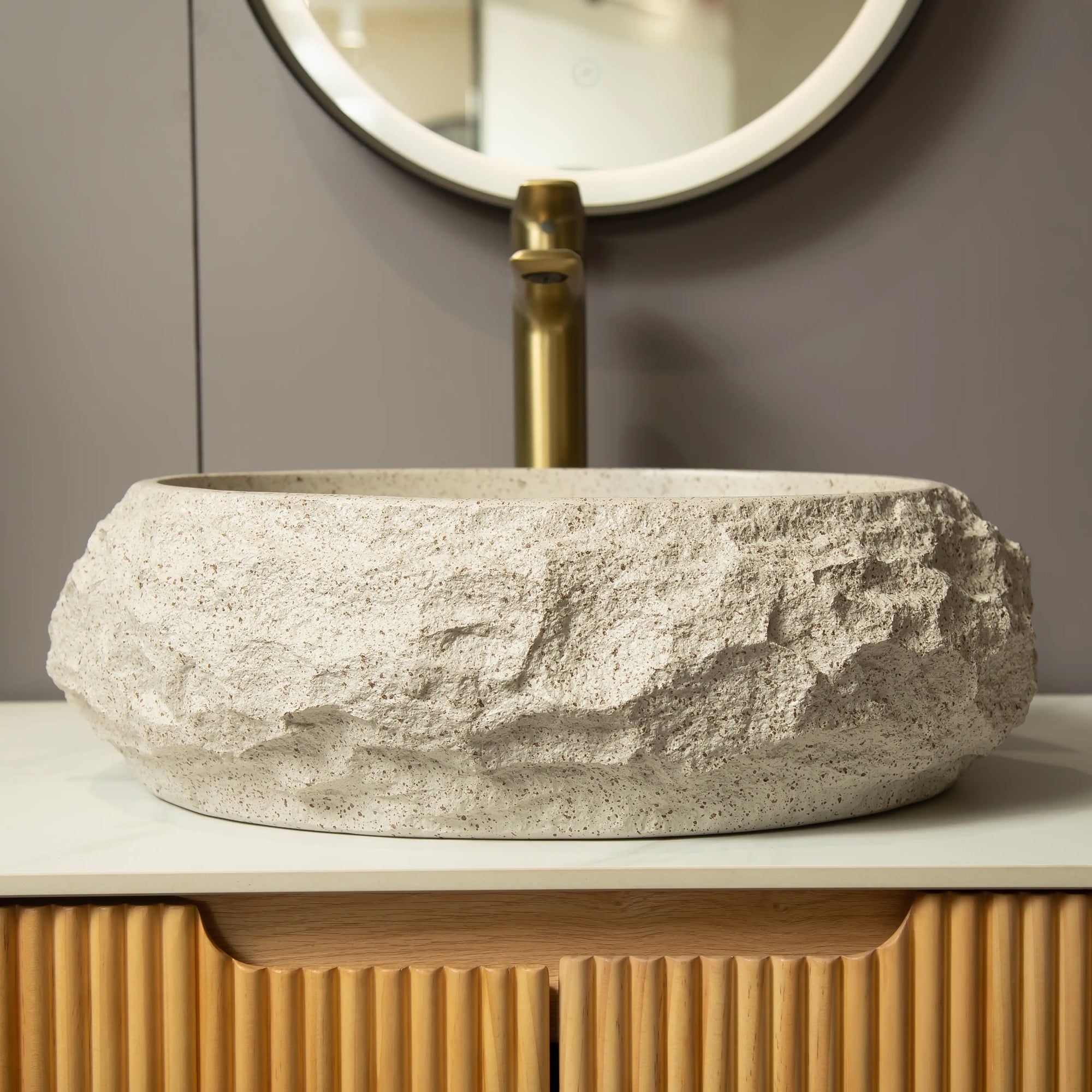 Stone-textured resin bathroom sink with natural handcrafted design
