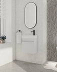 18" white bathroom sink with vanity displayed in a bright modern bathroom interior | Ace Decor