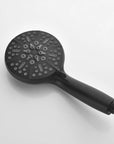 Close-up of the Dorian Series matte black 7-function handheld showerhead.