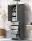 Tall grey bathroom linen cabinet with doors and drawers open, shelves organized with toiletries, towels, and bottles in a bright contemporary bathroom.