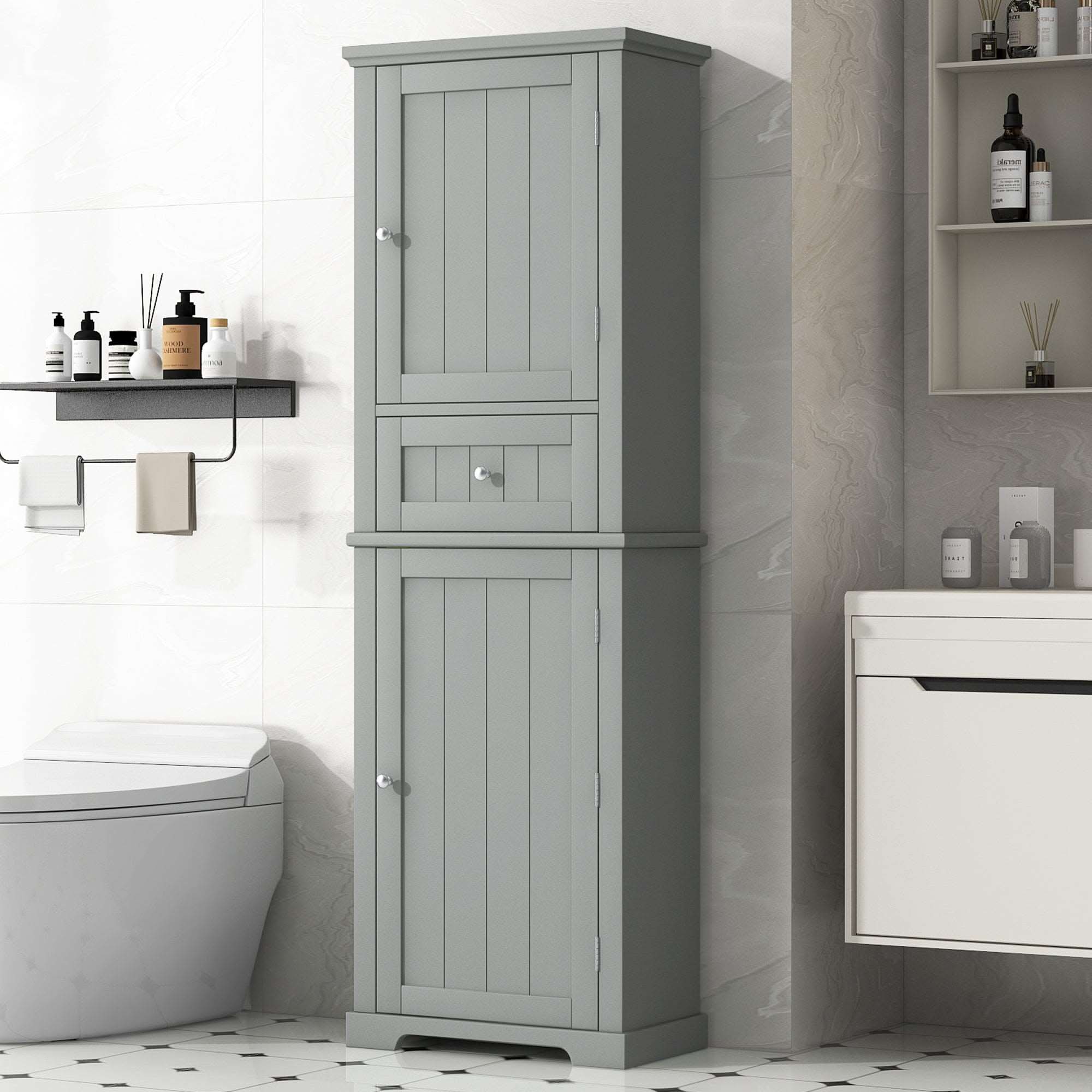 Norrin 67.3 inch grey tall narrow bathroom storage cabinet with closed doors and drawer in modern bathroom interior.