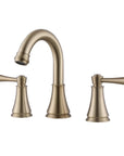 VALMIRA Brushed gold sink faucet with curved spout and matching handles.