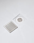 PVC shower drain with removable cover for easy hair collection and smooth drainage on anti-slip base | Ace Decor