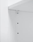 Adjustable storage shelf detail inside a freestanding bathroom vanity, offering flexible organization for modern family bathrooms | Ace Decor