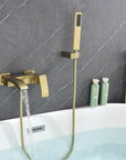 AURELIA Brushed Gold Wall-Mounted Bathtub Faucet filling tub with steady water flow.