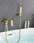 AURELIA Brushed Gold Wall-Mounted Bathtub Faucet filling tub with steady water flow.