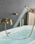 AURELIA Brushed Gold Wall-Mounted Bathtub Faucet with handheld shower function for flexible rinsing.