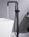 Black Freestanding Tub Faucet filling white bathtub.