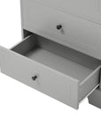 Grey bathroom cabinet with deep lower drawer pulled open, emphasizing ample storage space.