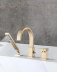FLUNIX Brushed Gold Waterfall Roman Tub Faucet Set installed on bathtub, handheld shower spraying water.