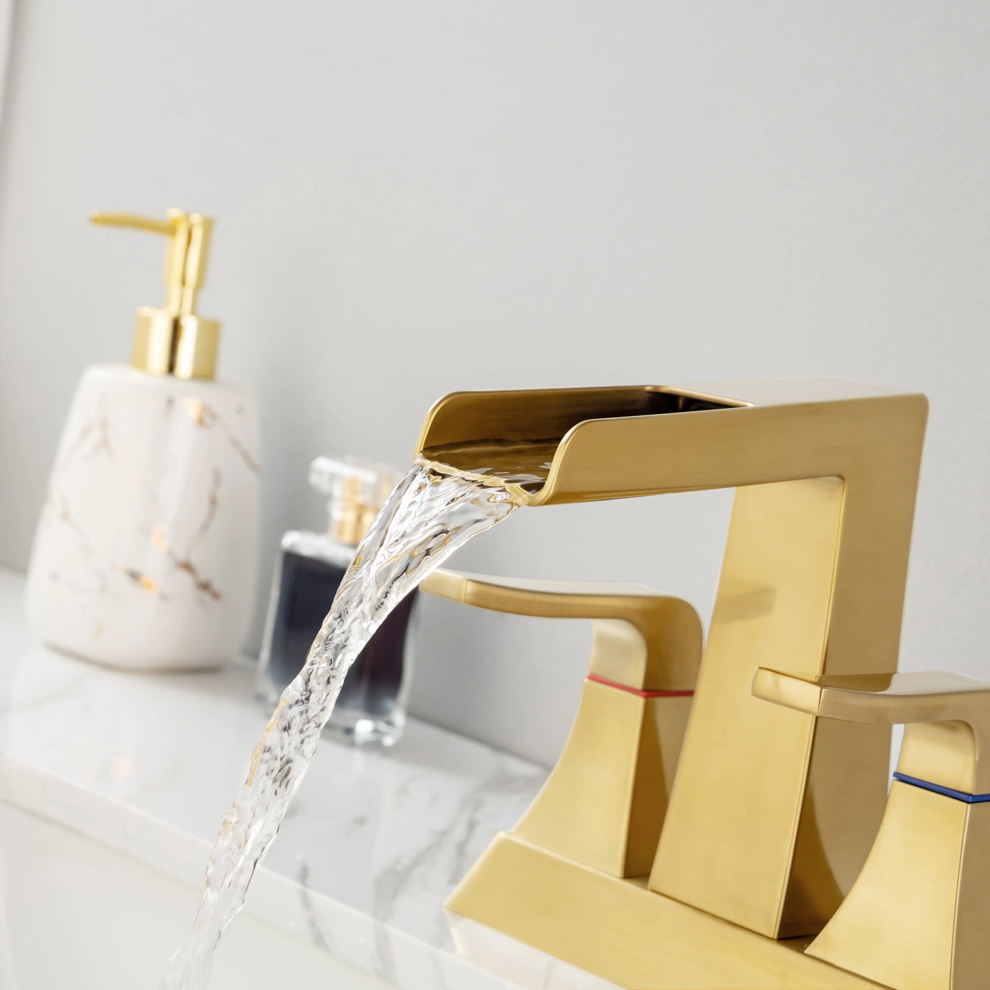 Aurora Series brushed gold bathroom faucet with smooth water stream, ideal for everyday use