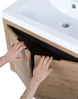 Walden Series 24 inch floating vanity with hidden door handles for a clean modern look.