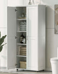 Tall 71.25-inch white bathroom tower cabinet with double doors open in a contemporary bathroom setting.