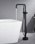Black Freestanding Tub Faucet filling white bathtub.