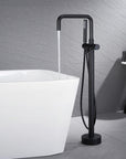 Black Freestanding Tub Faucet filling white bathtub.