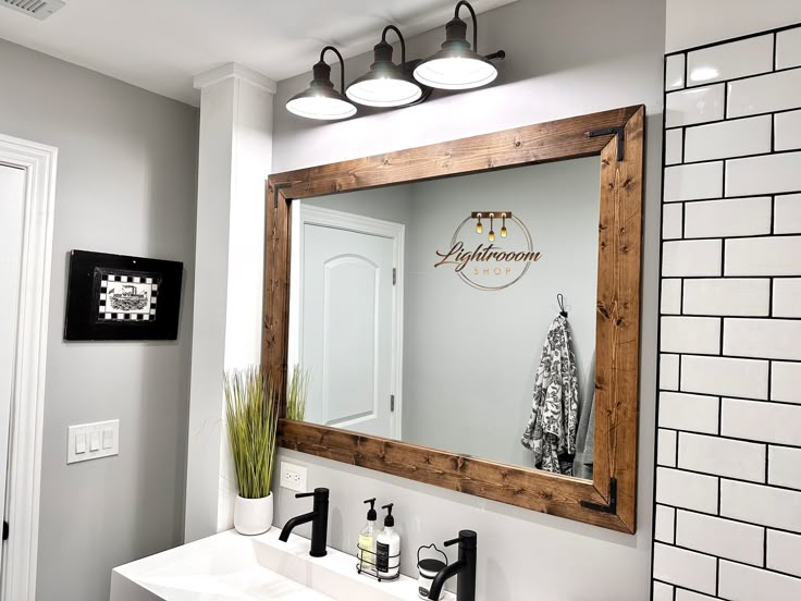 Rustic dark wood frames for bathroom mirrors ideal for farmhouse or industrial bathroom designs