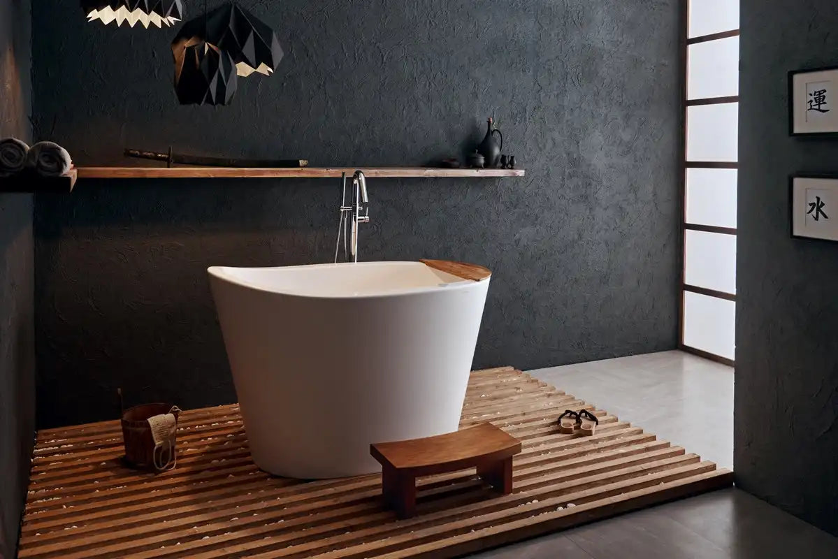 A minimalist spa-style bathroom featuring a freestanding soaking tub inspired by traditional Japanese bathtubs. | ACE DECOR