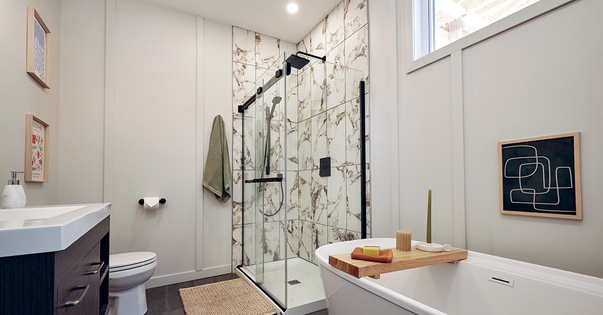 frameless sliding shower door in a modern bathroom | ACE DECOR