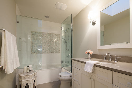 a bright and elegant bathroom featuring a half-glass bathtub door with a hinged design, complemented by neutral tones and stylish decor for a modern and cozy ambiance. | ACE DECOR