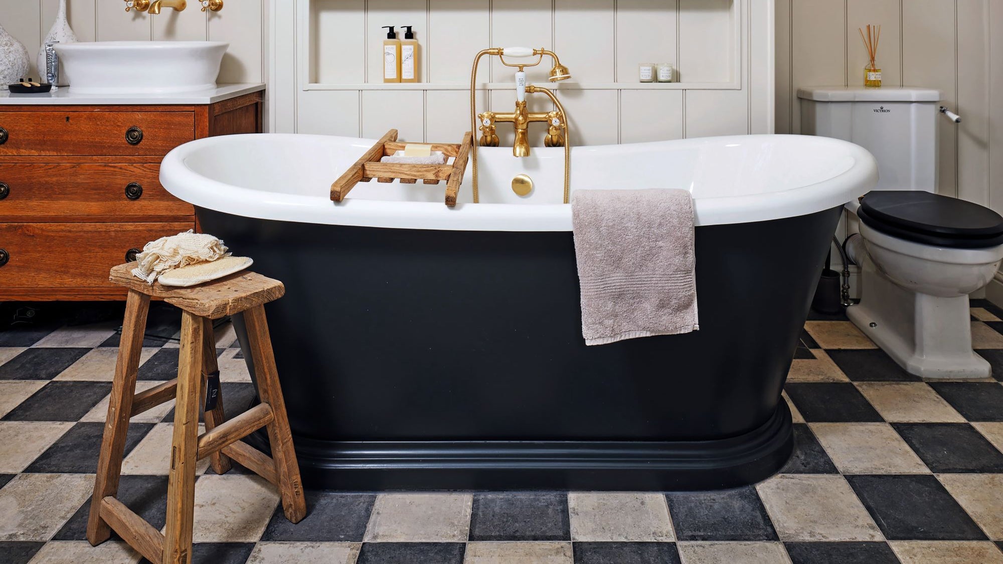 Bauhaus style bathroom with a black bathtub | ACE DECOR