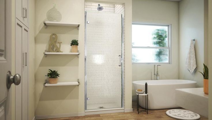Spa-like bathroom with patterned glass and a chrome continuous hinge shower door.