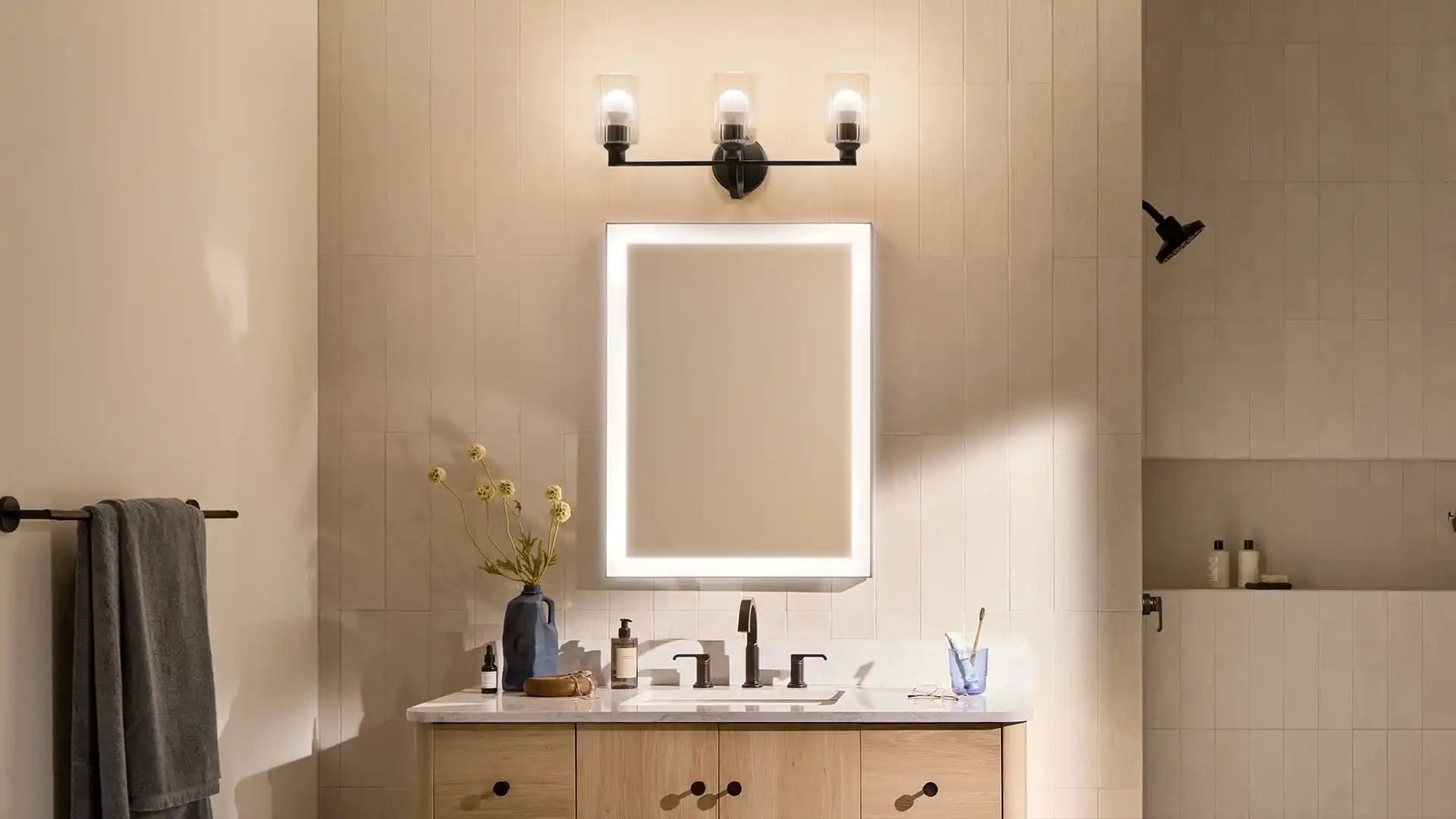 modern bathroom with LED mirror above 30 inch vanity – example of what size mirror for 30 inch vanity works best