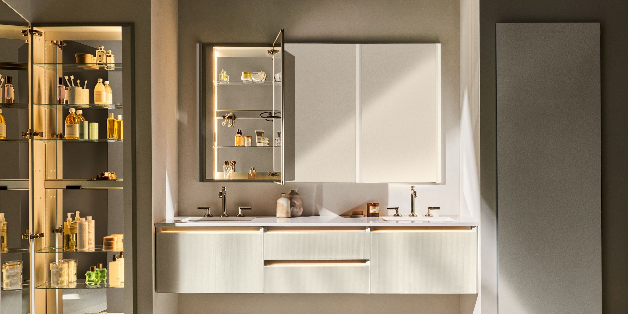 Modern double-sink setup with interior LED lighting, ideal to replace bathroom mirror cabinet for added storage and elegance.