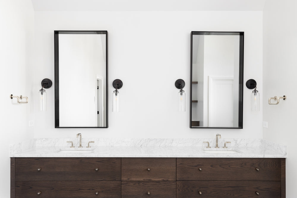 Black-framed mirrors for double vanity bathroom with modern dark wood cabinet