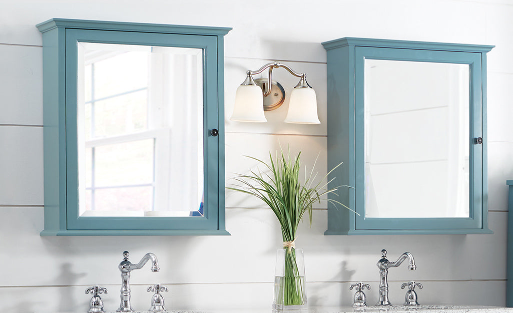 Classic farmhouse-style bathroom mirror medicine cabinet ideas with blue frames