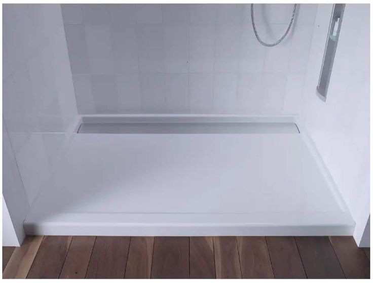 Modern rectangular premade shower base with linear drain design for minimalist bathrooms.