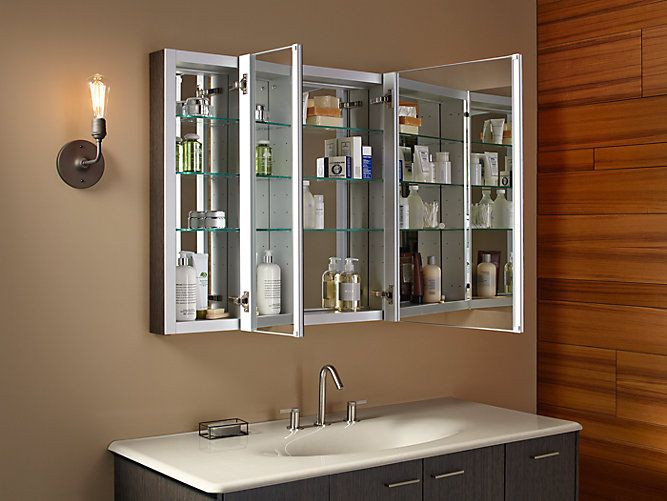 Triple-door lighted bathroom mirror cabinet with adjustable glass shelves and sleek storage design