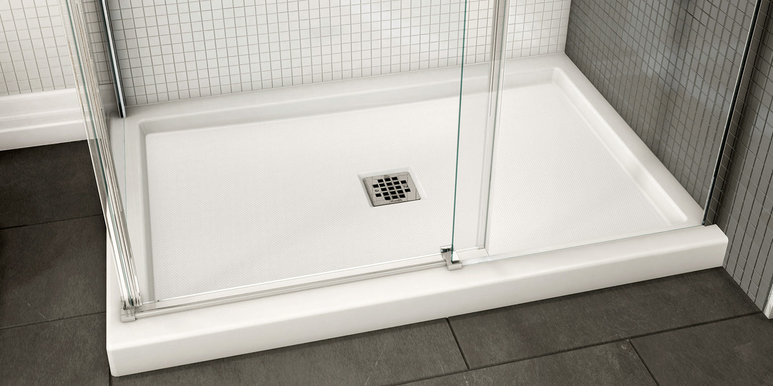 Modern bathroom with a sleek white Shower Floors Bases, glass enclosure, and textured non-slip surface