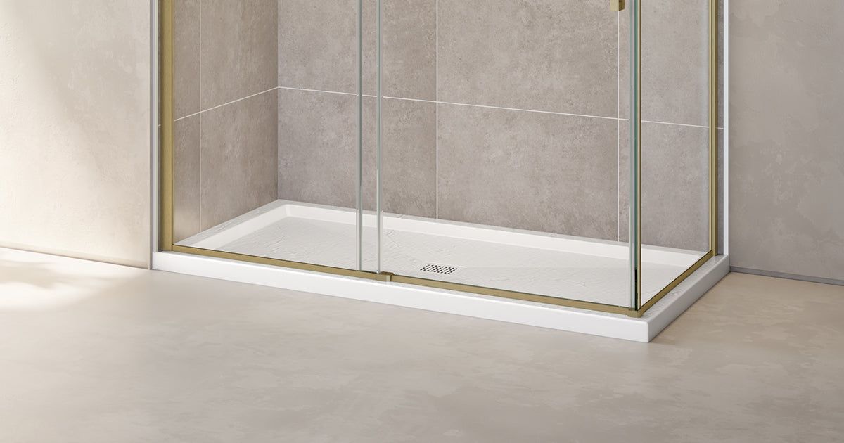 A white standard shower base size with a sleek glass enclosure and modern tile wall