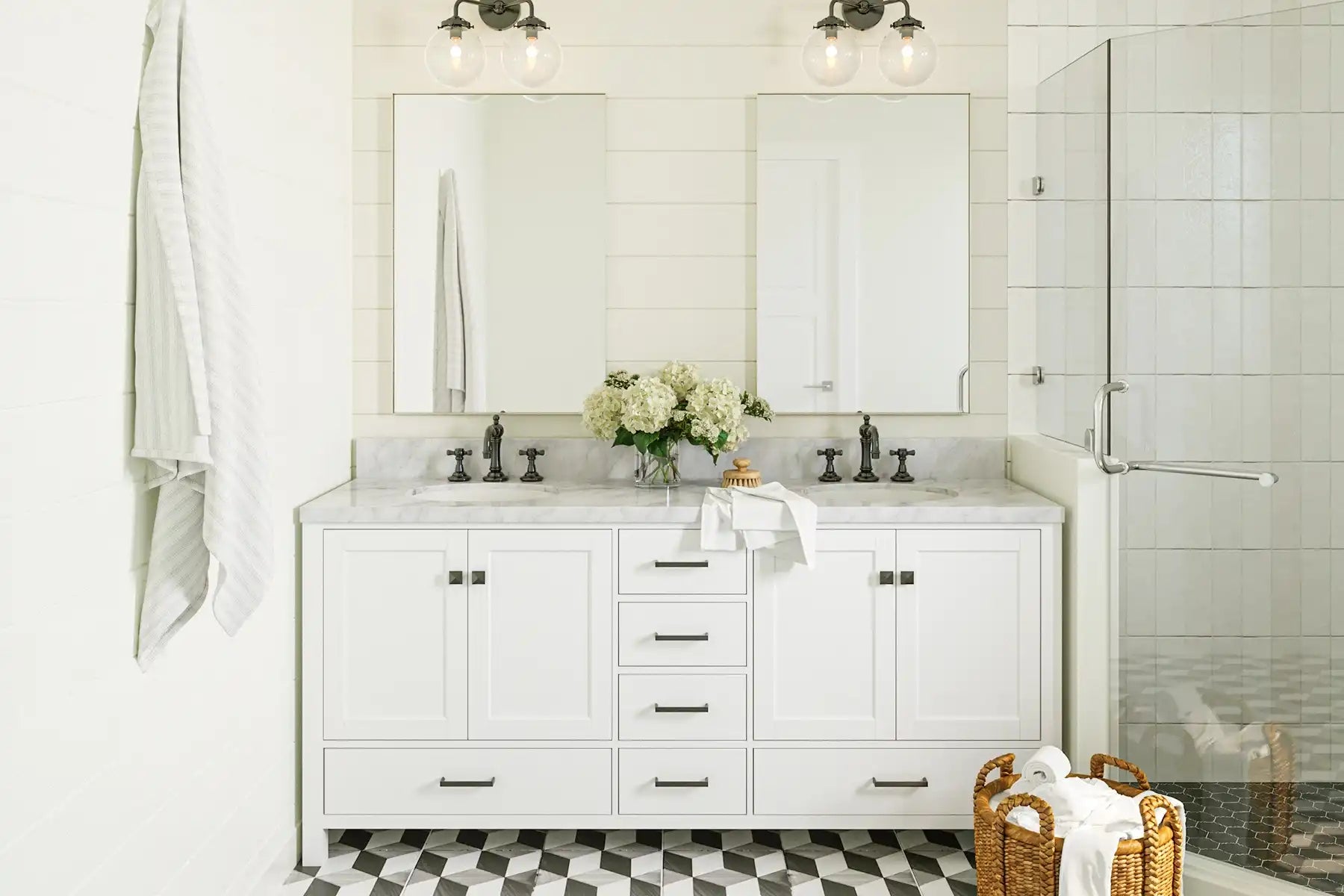 White double vanity bathroom with two rectangular wall-mounted types of mirrors for a clean and modern look.
