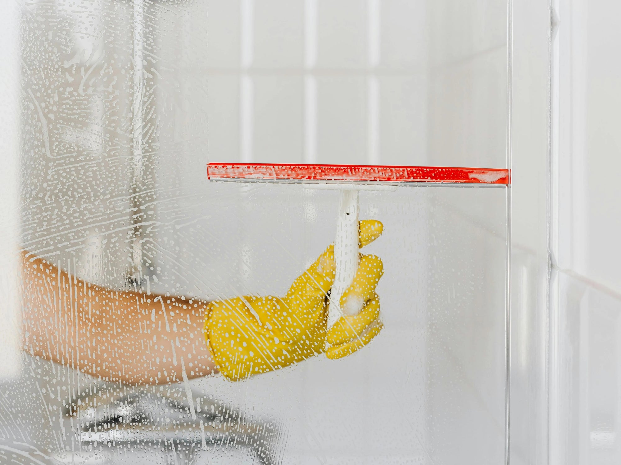 Hotel Housekeepers’ Secrets: Keeping Glass Shower Doors Crystal Clear